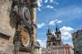 The famous astronomical clock and the Tyn church in Prague Royalty Free Stock Photo