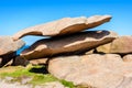 Famous `Painter`s Palette` balanced boulder on the Pink Granite Coast in Brittany, France.