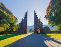 The famous Bali Handara. The Hindu Temple with ancient gate with pathway in park garden at noon. Hindu architecture landscape Royalty Free Stock Photo