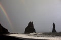 Famous basalt sea stacks of Reynisdrangar, rock formations on the black sand of Reynisfjar beach, view not far from Vik, a small v Royalty Free Stock Photo