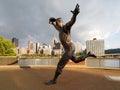 Famous baseball player sculpture and downtown of Pittsburgh