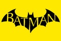 The famous Batman logo, isolated on yellow background.