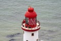 The famous Beachy Head lighthouse located on the rocky beach of Beachy Head the chalk headland cliffin East Sussex Royalty Free Stock Photo