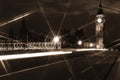 Famous and Beautiful night view to Big Ben and Houses of Parliament from Westminster Bridge through nigh lamp rays, London, UK Royalty Free Stock Photo