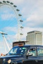 Famous black cab an a street in London