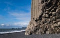 The famous Black Sand ocean Beach, mount Reynisfjall and Picturesque Basalt Columns, Vik, South Iceland. Dyrholaey Cape and rock