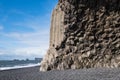 The famous Black Sand ocean Beach, mount Reynisfjall and Picturesque Basalt Columns, Vik, South Iceland. Dyrholaey Cape and rock