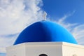 Famous blue domed church in Oia