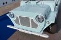 famous blue vintage open-top car at the yacht show in Monaco on a sunny day, close-up