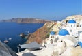 Beautiful blue domed and white buildings in Santorini, Greece Royalty Free Stock Photo