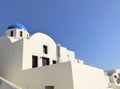 Beautiful blue domed and white buildings in Santorini, Greece Royalty Free Stock Photo