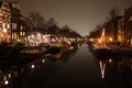 Famous bridge in amsterdam. romantic night landscape. a bit of haze and fog makes the magic channel Royalty Free Stock Photo