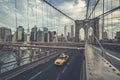 Famous Brooklyn Bridge with cab