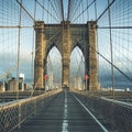 On the famous Brooklyn Bridge in the morning