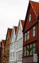 Famous Bryggen street with wooden colored houses in Bergen, Norway, UNESCO world heritage cite Royalty Free Stock Photo