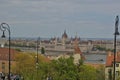 The famous building of the Hungarian Parliament and the Danube river in the cityscape of Budapest.