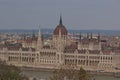 The famous building of the Hungarian Parliament and the Danube river in the cityscape of Budapest.
