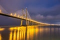 The famous cable-stayed Vasco da Gama bridge in Lisbon at night Royalty Free Stock Photo