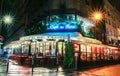 The famous cafe de Flore at rainy night, Paris, France.