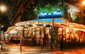 The famous cafe de Flore at rainy night, Paris, France.