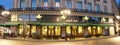 The famous cafe de la Paix located near opera house -Garnier palace in Paris, France. It had been inaugurated on May 5th Royalty Free Stock Photo