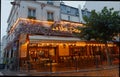 The famous Cafe Le Vrai Paris . It is located in the Montmartre, Paris, France.