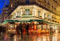 The famous cafe Les deux magots at night, Paris, France. Royalty Free Stock Photo