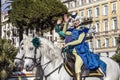 Famous Carnival of Nice, Flowers` battle. Two Amazons riding two white horses