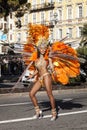 Famous Carnival of Nice, Flowers` battle. A woman in costume dancing on carnival Royalty Free Stock Photo