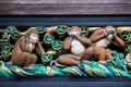 Famous carvings of SanzaruThree Wise Monkeys at ShinkyushaSacred Stable in Toshogu Shrine,Nikko,Japan.