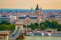 Famous Chain bridge and Saint Stephen Basilica in Budapest, Hungary Royalty Free Stock Photo