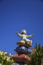 Little angelic girl sitting on comfy pillow tower, colorful artwork, Kyiv, Ukraine