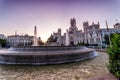 Cibeles Fountain and the city hall building in Madrid Spain at sunrise