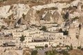 Famous city with rock chimneys in Cappadocia valley. Goreme, Turkey Royalty Free Stock Photo