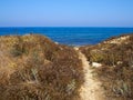 Famous coastal broadwalk path surrounding the archaeological park Paphos Cyprus