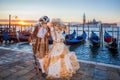 Colorful carnival masks at a traditional festival in Venice, Italy