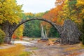 Famous Devil`s Bridge in Azalea and Rhododendron Park Kromlau, Germany under construction until October 2020