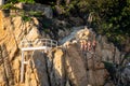 Famous divers prepare to jump and dive off a tall cliff in Acapulco Mexico Royalty Free Stock Photo