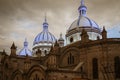 Famous domes of the New Cathedral in Cuenca, Ecuador rise over the city skyline Royalty Free Stock Photo