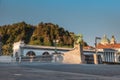 Famous dragon bridge or zmajski most, a landmark in ljublana, slovenia in early morning hours. Nobody around. Detail of dragon and Royalty Free Stock Photo