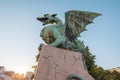 Famous dragon bridge or zmajski most, a landmark in ljublana, slovenia in early morning hours. Nobody around. Detail of dragon and Royalty Free Stock Photo