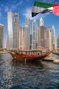 Dubai Marina with boats against skyscrapers in Dubai, United Arab Emirates Royalty Free Stock Photo