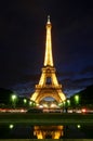 Famous Eiffel Tower with illumination on in Paris. Royalty Free Stock Photo