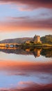 The Eilean Donan Castle with colorful sunset, Highlands of Scotland Royalty Free Stock Photo