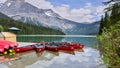 Emerald Lake, Yoho National Park, British Columbia, Canada. Turquoise water and green trees. Red canoe on the lake Royalty Free Stock Photo