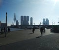 The famous Erasmus bridge from Rotterdam in the Netherlands and the surrounding modern buildings on a beautiful sunny day Royalty Free Stock Photo