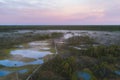 The famous Estonian Viru swamp at the dawn of the sun in summer, photo from a drone