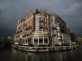 Famous facade of historical Amsterdam architecture style house building Hotel de leurope Holland Netherlands