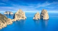 Famous Faraglioni Rocks near Capri Island, Italy. Beautiful paradise landscape with azure sea in summer sunny day Royalty Free Stock Photo