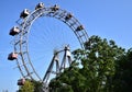 The famous Ferris wheel, Prater`s amusement park in Vienna, stands out against the clear blue sky. Royalty Free Stock Photo